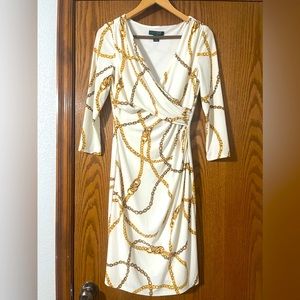 Lauren Ralph Lauren iconic white faux dress with chain design detail.